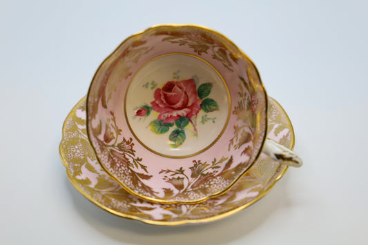 Beautiful pink and gold tea cup with rose inside, contains pink sugar crystals soy candle.