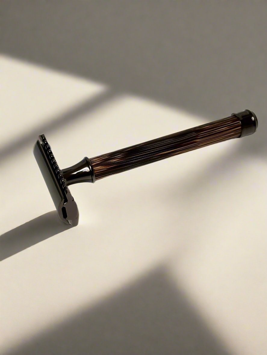 Bamboo razor with stainless steel metal, white background