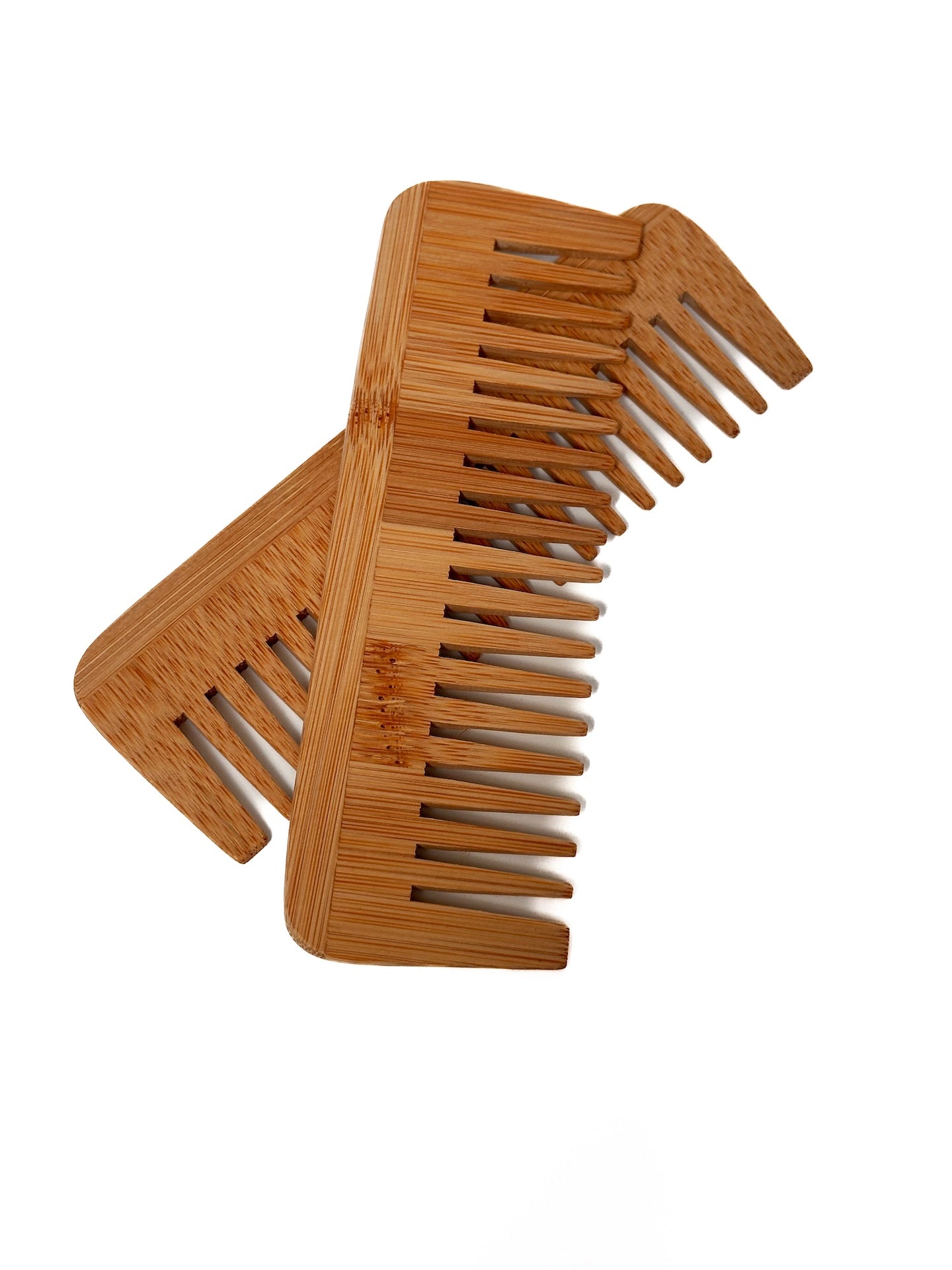 2 bamboo combs on top of each other