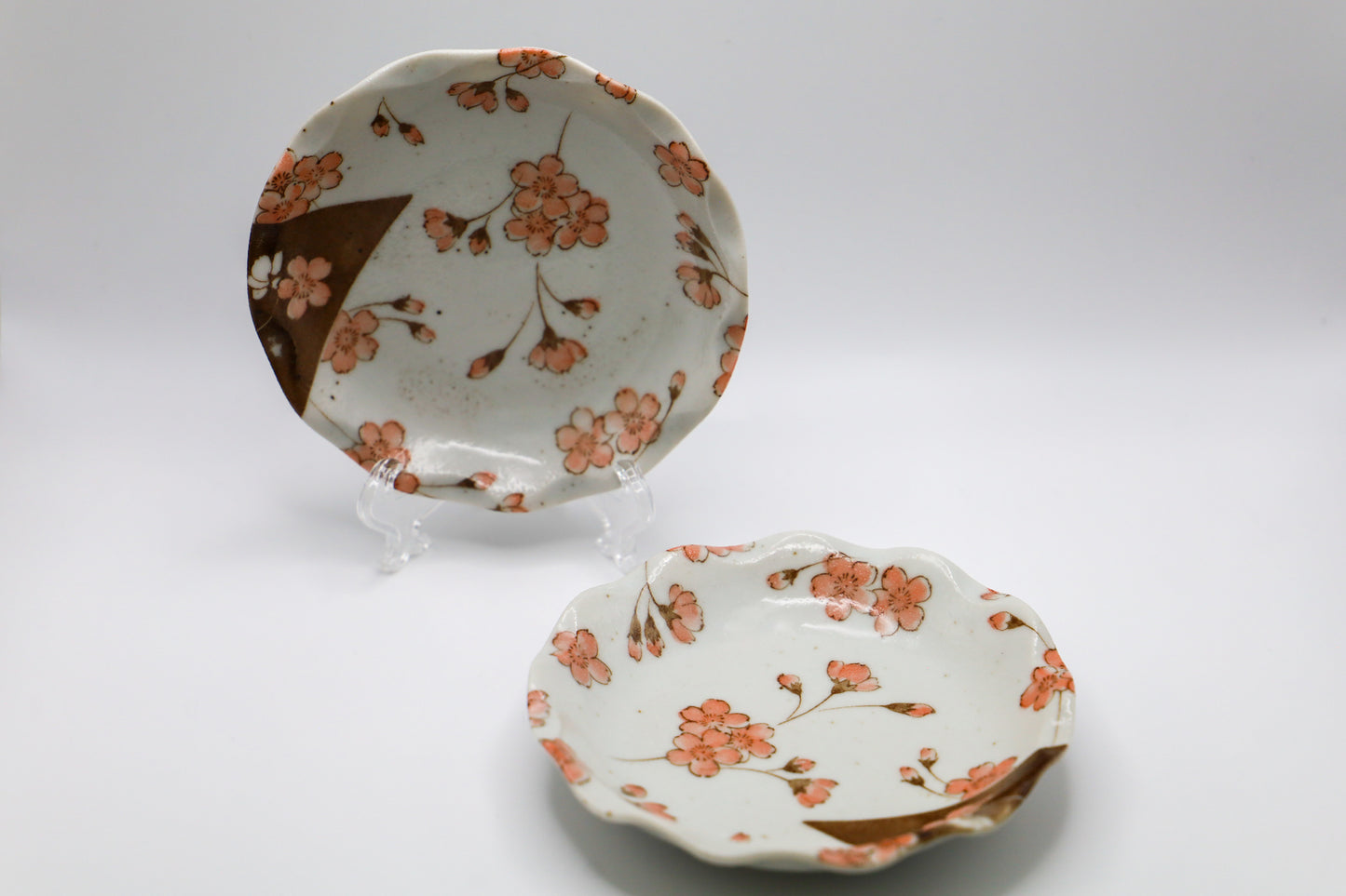 Scalloped stoneware with cherry blossoms