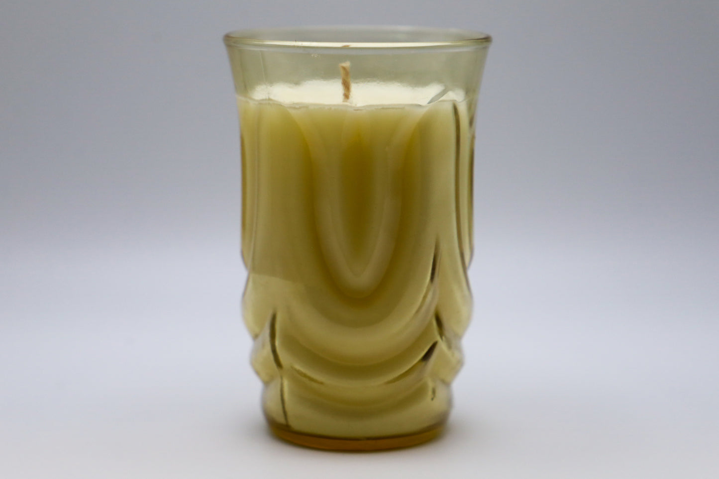 Colonial Tulip Amber Glass with milk and honey scented soy candle.