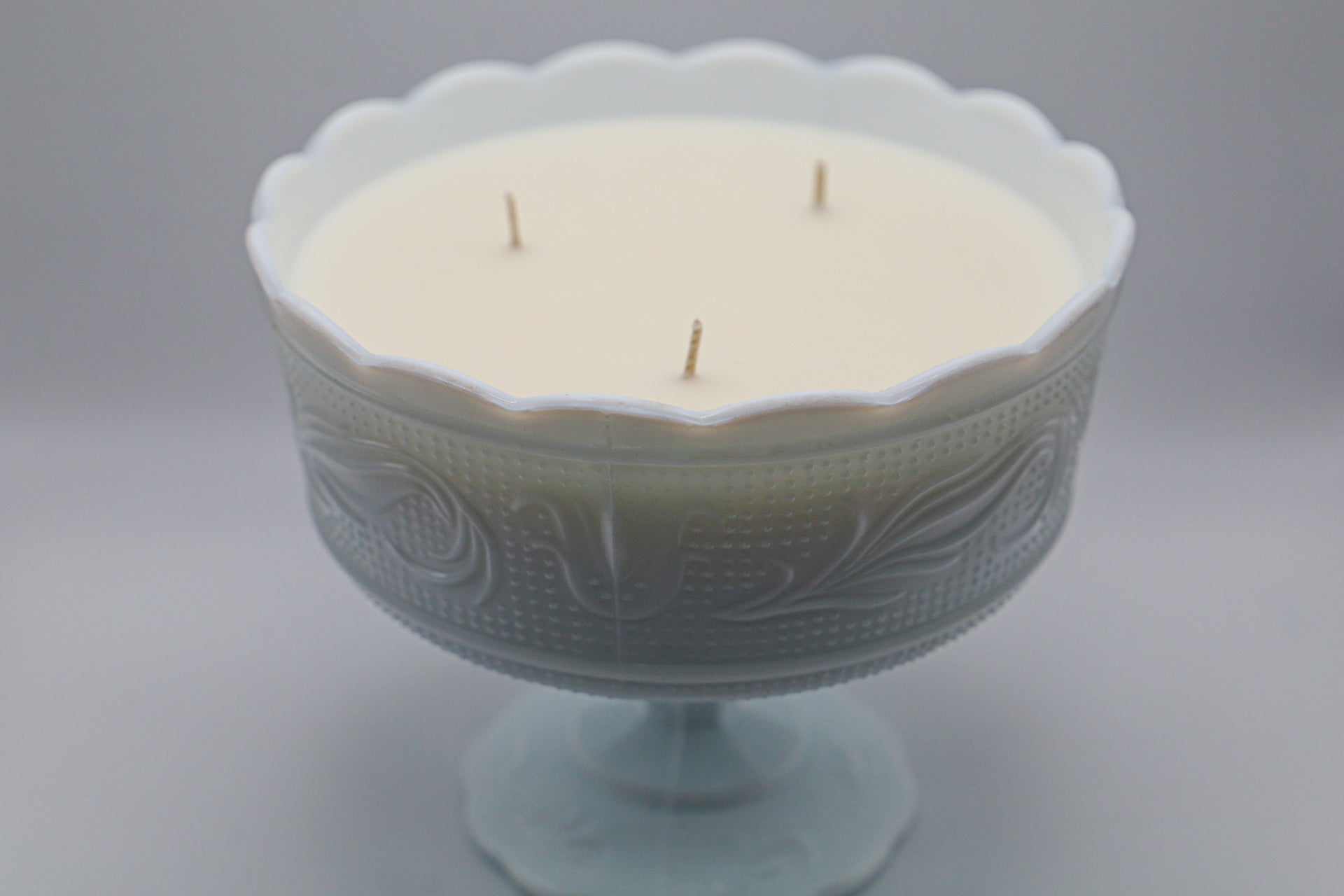 White milk glass compote with Caramel Apple Scented Candle