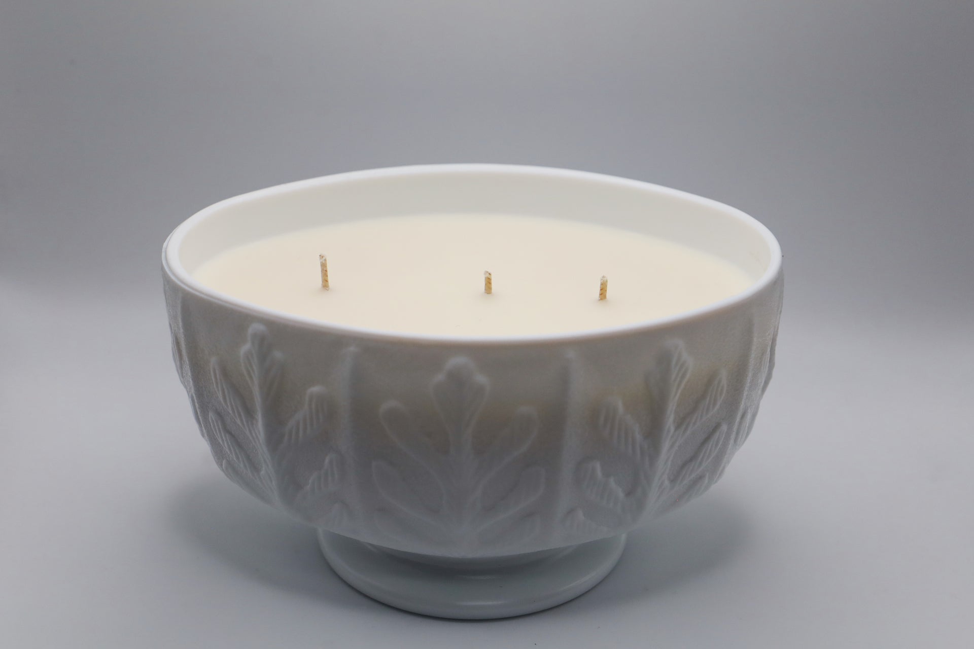 FTD Oak Leaf Pattern container with 3 wick Apple Bourbon scented soy candle.