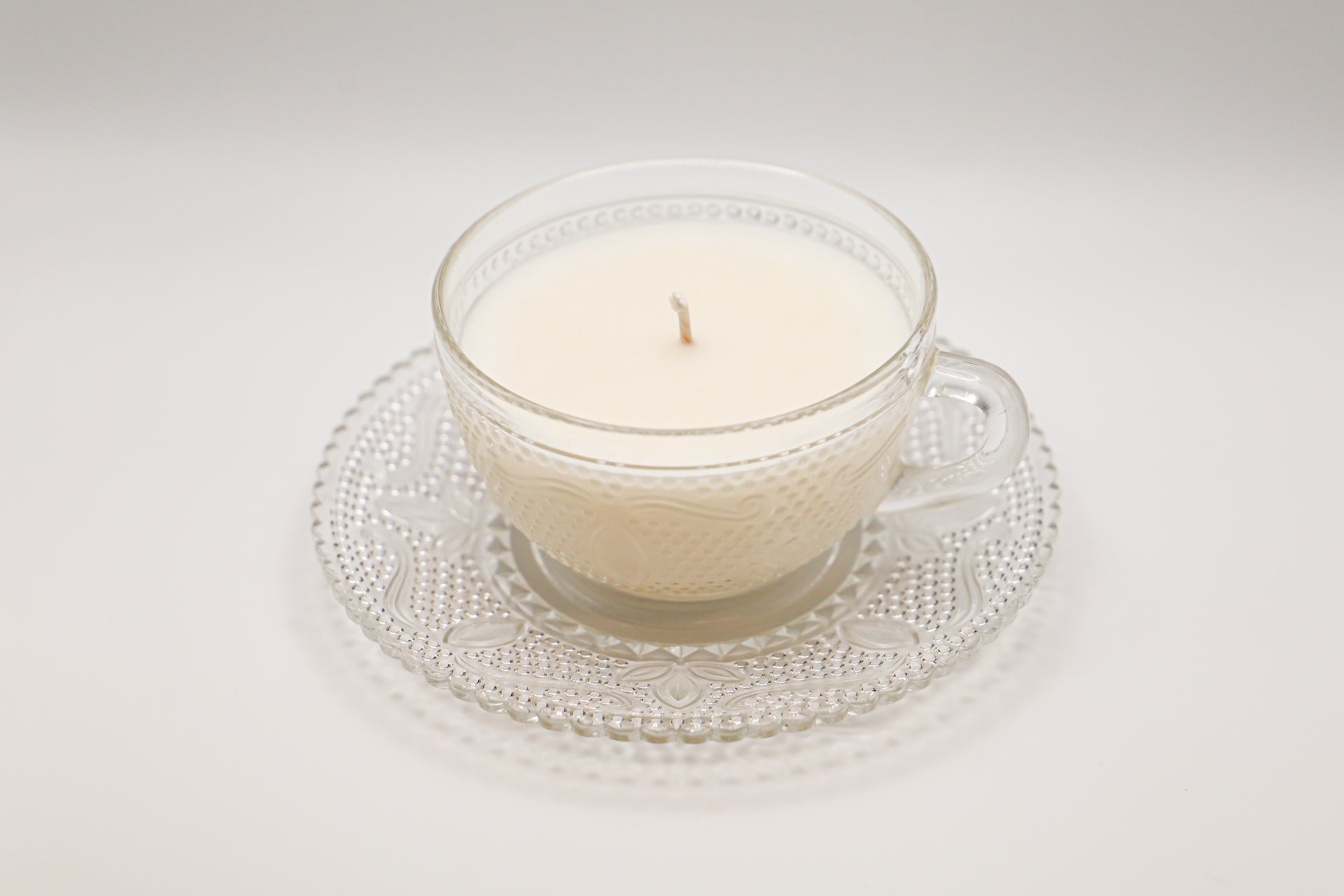Federal Glass Heritage pattern cup and saucer with soy candle in multiple scents