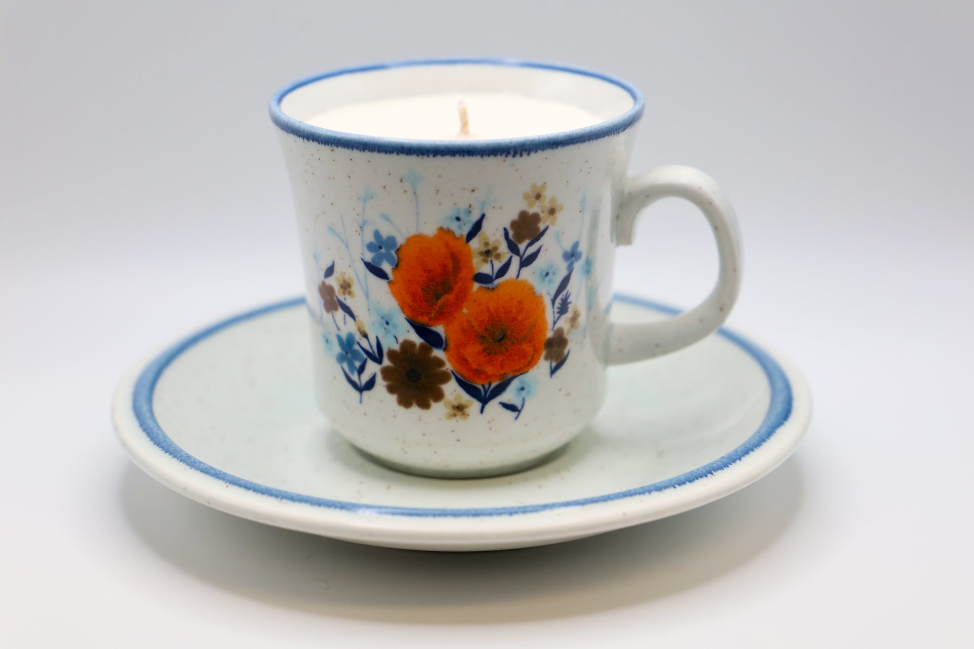 Gay Paree Cup and Saucer by Mikasa with Apricot Grove scented soy candle