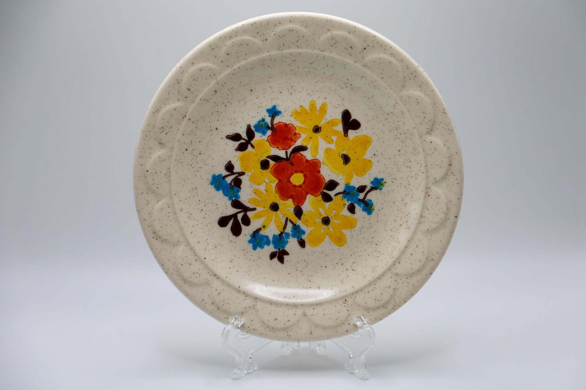 Colorful Homer Laughlin small plate with orange, yellow and blue flowers