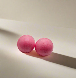 2 pink bath bombs