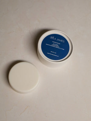 Shave butter bar sitting near the packaging.