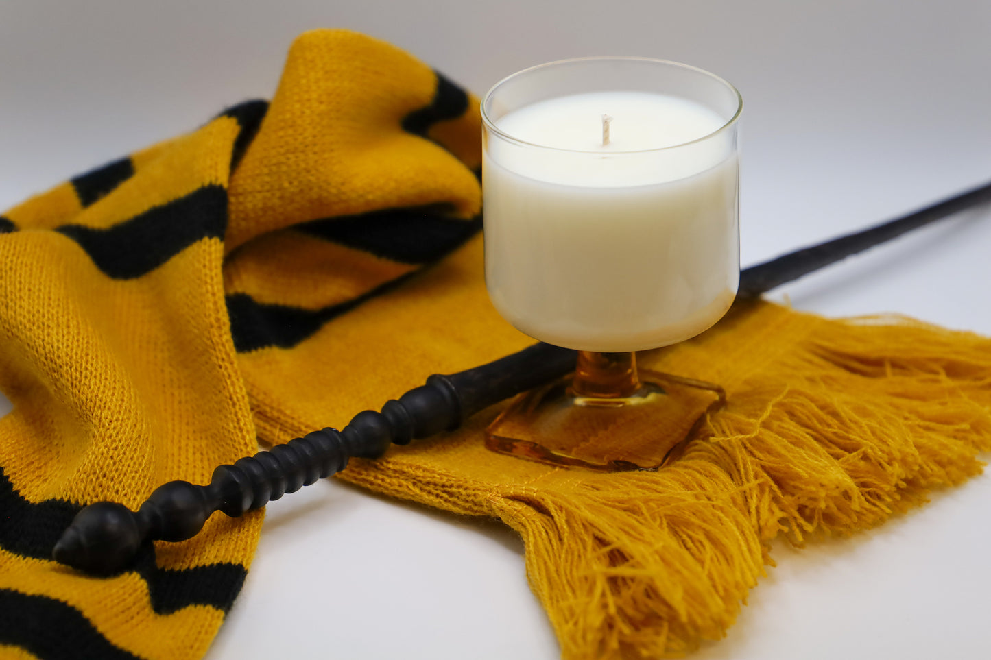 Nordic Topaz Glass with amber stem, Milk & Honey scented soy candle.
