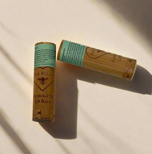 2 lip balms in bamboo containers