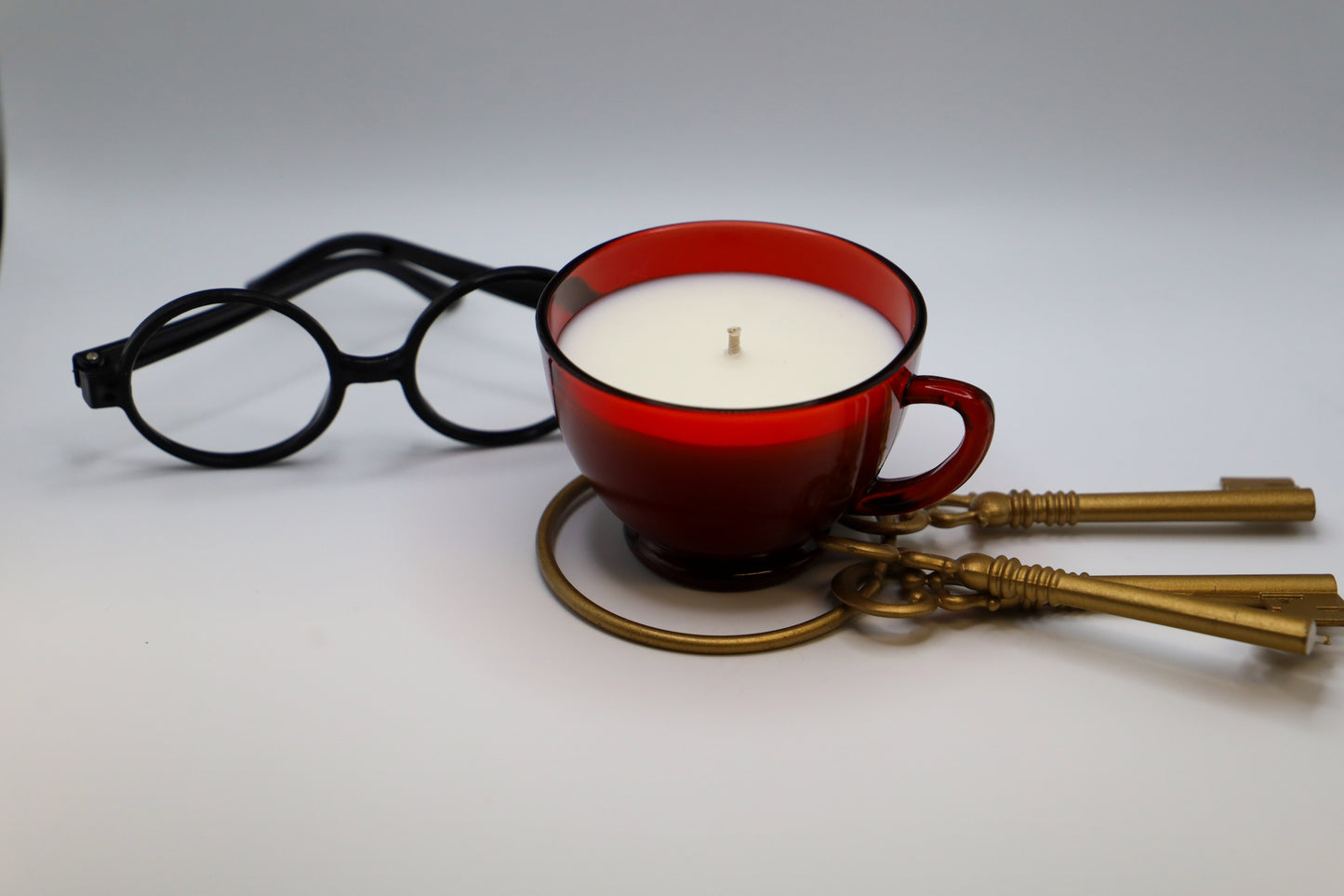 Royal Ruby Punch Cup by Anchor Hocking with soy candle in "Lion" scent.