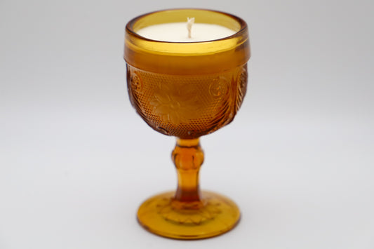 Tiara pressed amber glass with Tobacco & Amber scented soy candle.