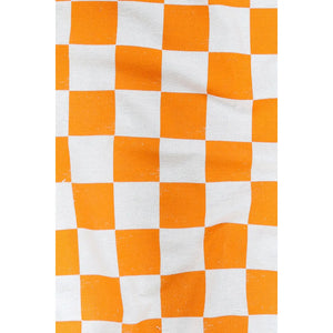 White and orange checkered tea towel.