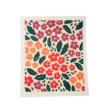 Swedish dishcloth with pink, orange, and coral flowers.